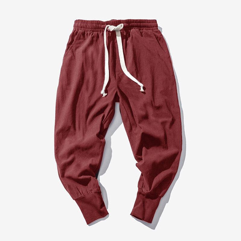 メンズ100％コットンドローストリングソリッドカラーカサウルパンツ